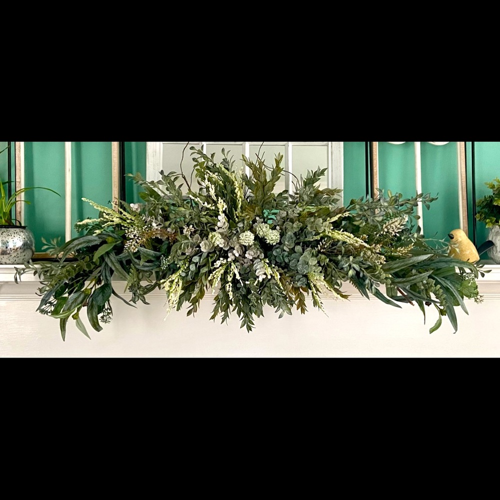 Simple Spring swag wreath.  It is handmade and about 41 in x 18 in.